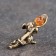 A purse souvenir "mouse with a spoon", with natural amber