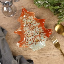 A plate in the form of a Christmas tree 