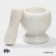 A mortar with a “marble” push, made of natural stone, white color
