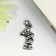 Decor for creativity Metal "Bear with chamomile" silver 2x1 cm