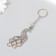 Metal keychain "Peacock" silver/gold 7.2x3 cm