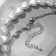 Piece "chain" top, pearl lock, white color in silver, 62 cm
