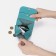 Monetnik on the button, the color is turquoise