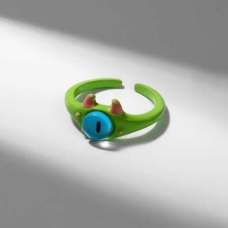 Ring "Montrustrik" with horns, the color is green, dimensionless