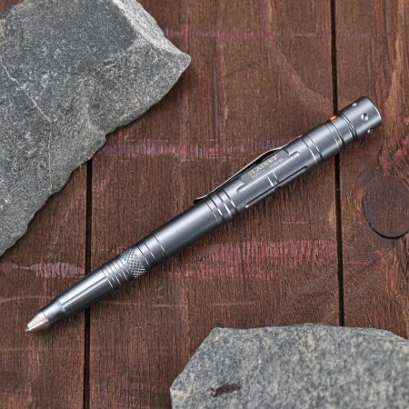 A glass-glass with a flashlight and a knife. Mix