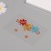 Sticker of rhinestones plastic on the face "Three Flowers" bright colors 14.5x16 cm