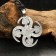 Protective amulet "Swastika Saturn", 35x35mm, metal