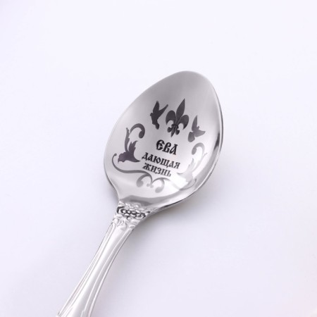 A spoon is registered, tea, with an engraving "Eva", h = 14-2