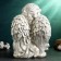 Figure "Big Angel sits with flowers" 34x23x23cm