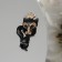 Brooch "cat" mysterious, black and white color in gold