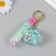 A keychain plastic with a carbine, a strap "Flying Blue Blue" Water with decor1.8x5.3x5.6 cm