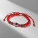 Bracelet-reinforcing “red thread” hand of Hams happiness, lenses, blue color in black silver, d = 8 cm