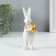 Souvenir Polystone "Easter rabbit with a gold egg" 4x4x13 cm