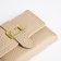 Women's wallet on the button, beige color