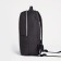 A backpack with a zipper, "saxi", a laptop department, black color