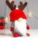 Interior doll "Santa Claus in a red hat with horns" 20x13x11 cm