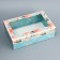 The box is folding, the lid is “the most beautiful”, 30 x 20 x 9 cm with the window