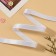 Gum for straps, shiny, 10 mm, 50 ± 0.5 m, white color