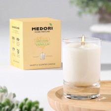 Aromatic candle in a glass of Medori 