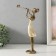 Polystone souvenir "Girl plays on the pipe, with a bird" Sand with bronze 19x6.5x27.5 cm
