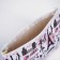 Cosmetic bag with lightning, white/pink color