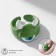 Ring "Montrustrik" with horns and eye, the color is green, dimensionless