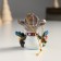Souvenir Polystone Snowman "Snowman with a watering can on the head, holds a garland" 6x5x6 cm