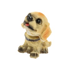 Dog on a car panel shocking his head, mini, dog