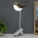 Table lamp on the clothespin "Bird" LED 3000-6000K 5W USB gold 20x7x34cm RISALUX