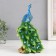 Polystone souvenir "Blue peacock with a green tail" 12.5x14x25 cm