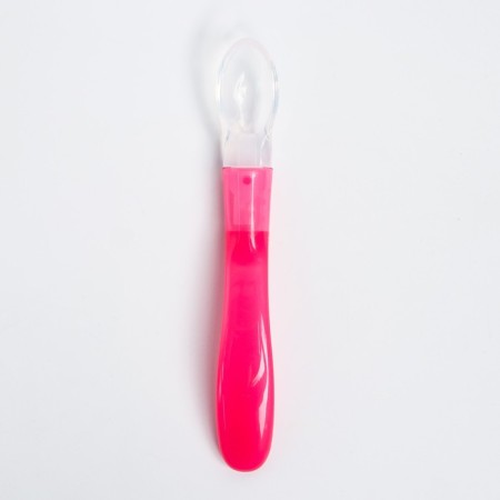 A spoon for nursery for feeding silicone, from 5 months, pink color