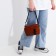 Youth bag with zipper, 1 outer pocket, brown color