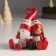 Suvenir Polystone "Santa Claus and granny with a gift, sit" 10x7.5x10 cm