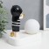 Souvenir Polystone Light "Baby in a black cap, with a gold bubble at the ball" 16.5x8x16 cm