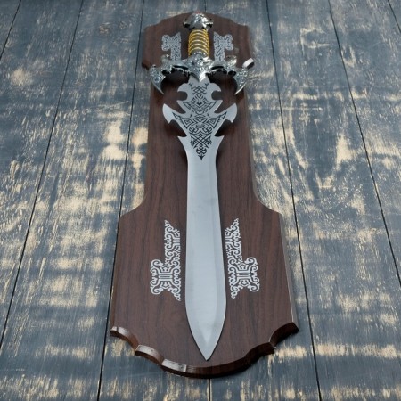Souvenir sword on a tablet, carved blade, gold hilt with the head of a dragon-1
