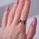 Ring "spell", black color in silver, dimensionless