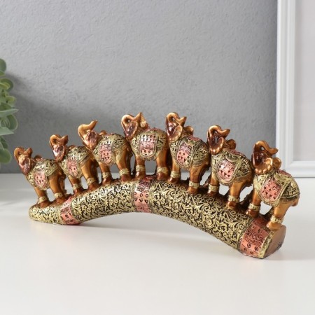 Souvenir Polystone "Seven African elephants in the gold, openwork blanket" 10.7x29x4 cm-2