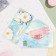 Money envelope "Congratulations!" glitter, flowers in the background, 17x8 cm