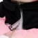 Soft toy "Bunny Lin", in a black jacket and a pink skirt ", 20 cm