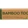 Middle bamboo toothbrush in the box, green