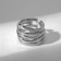 The ring "links" is wide, the color is silver, dimensionless