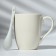 Ceramic mug with a spoon "Start the day with a smile", 310 ml, white color