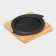 The cast -iron pan on the wooden stand “Circle. East Grill ", D = 15 cm, black color