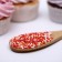 Confectionery sprinkling with the soft center "Bead": orange, red, silver, 50 g