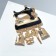 Brooch "Sewing Machine" with pendants, black color in gold
