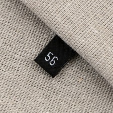 Textile strip “56”, 4.6 x 1.1 cm, black color