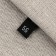 Textile strip “56”, 4.6 x 1.1 cm, black color