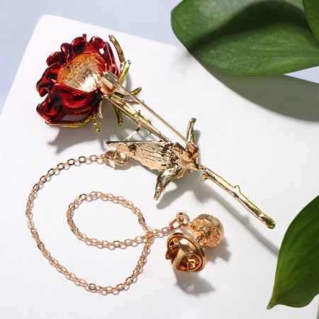 A brooch with an icon on the chain "flower" rose, the color is red-green in gold-1