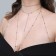 Erotic accessory on the body with rhinestones