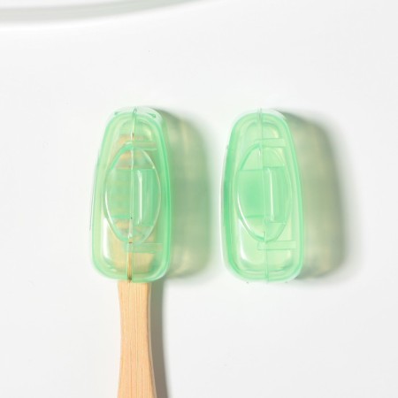 The case for the toothbrushes is “cooler than all”, 3.7 x 2.2 cm.-3